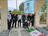 غبارروبی و عطر افشانی مزار شهید جنگ تحمیلی ۱۲ روزه و شهدای محله جیلارد شهر دماوند به‌مناسبت هفته بهزیستی